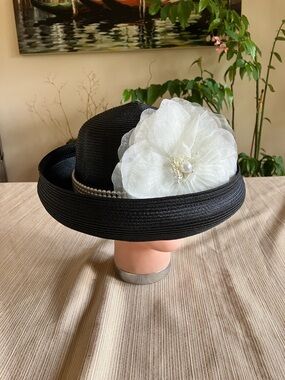 Elegant Black Women’s Dress Hat with White Floral Accent